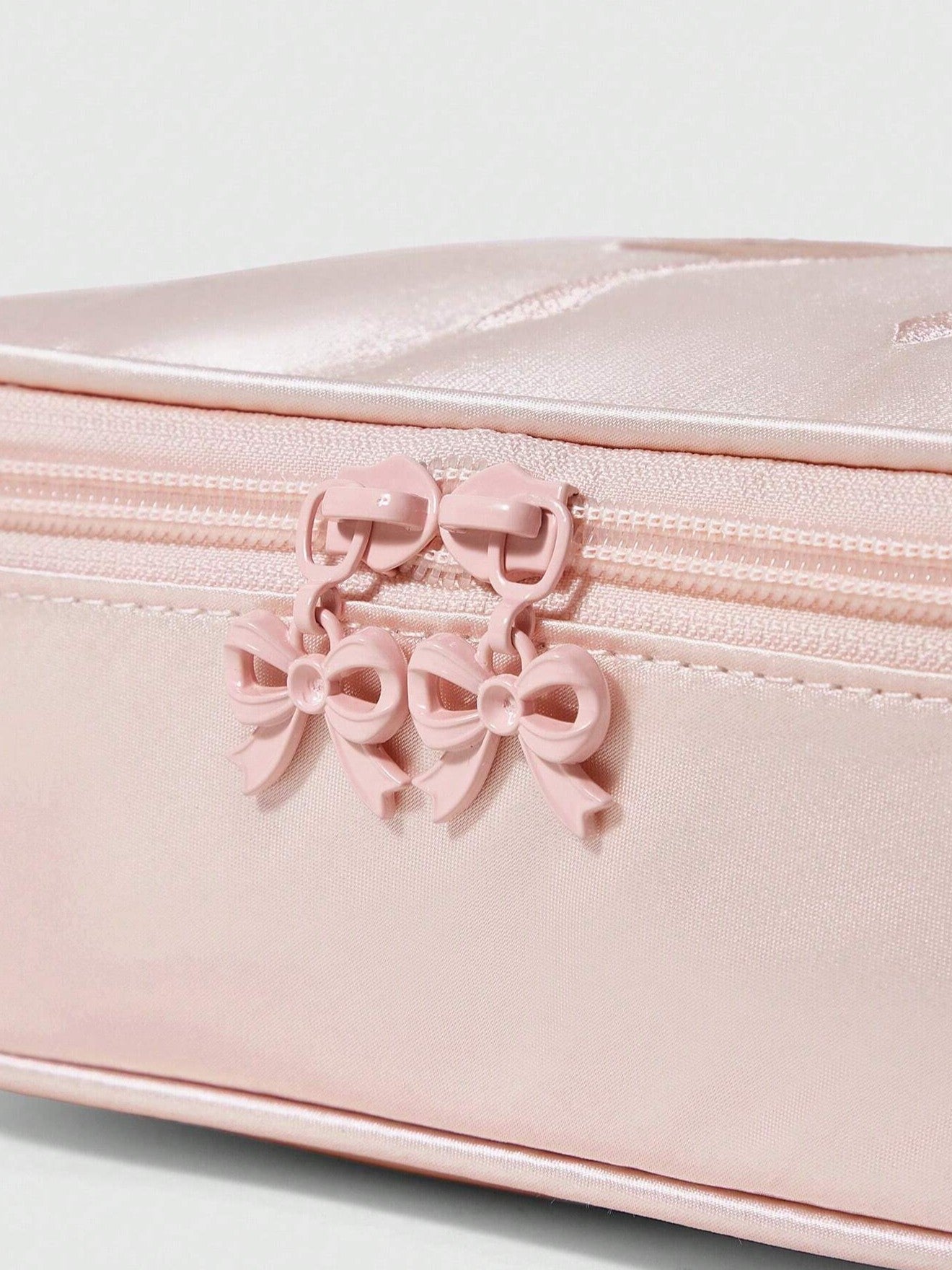 The Embroidered Mini Bow Makeup Bag